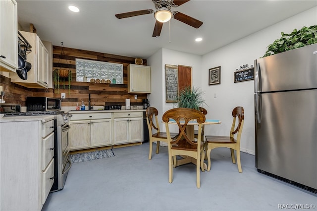 kitchen featuring tasteful backsplash, stainless steel fridge, ceiling fan, and white range oven