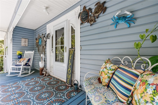 entrance to property with covered porch