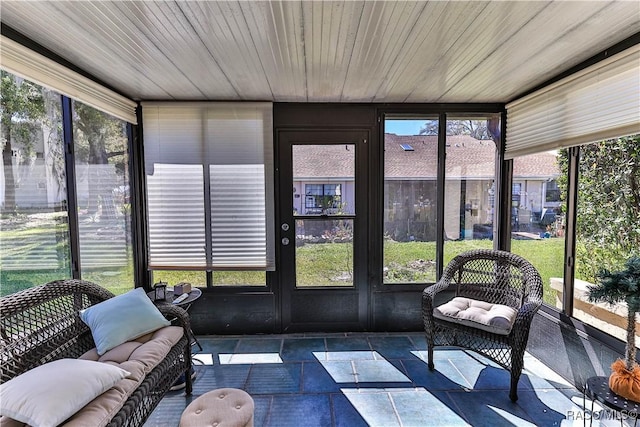 sunroom with wooden ceiling