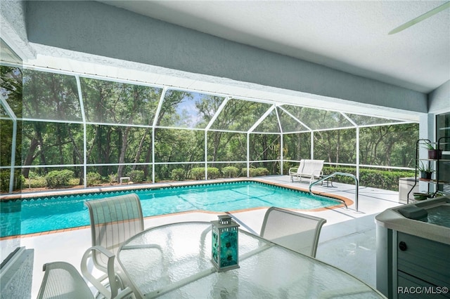1150 E Cleveland St, Hernando, FL 34442 - swimming pool featuring a patio area, ceiling fan, outdoor dining space, and a lanai
