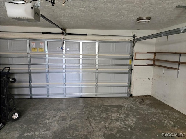 215 S Jefferson St, Beverly Hills, FL 34465 - garage featuring a garage door opener