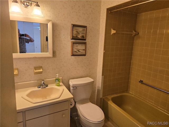 215 S Jefferson St, Beverly Hills, FL 34465 - bathroom featuring vanity, wallpapered walls, and  shower combination