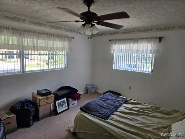 215 S Jefferson St, Beverly Hills, FL 34465 - carpeted bedroom with multiple windows and a ceiling fan