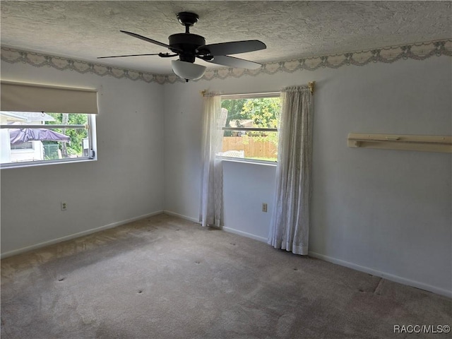 215 S Jefferson St, Beverly Hills, FL 34465 - spare room with carpet, a ceiling fan, and a textured ceiling