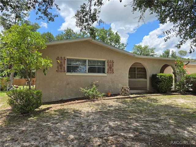 215 S Jefferson St, Beverly Hills, FL 34465 - view of front of property featuring stucco siding