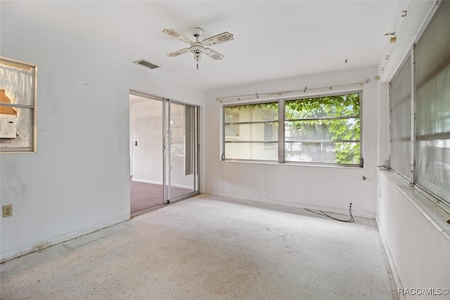 unfurnished room featuring ceiling fan