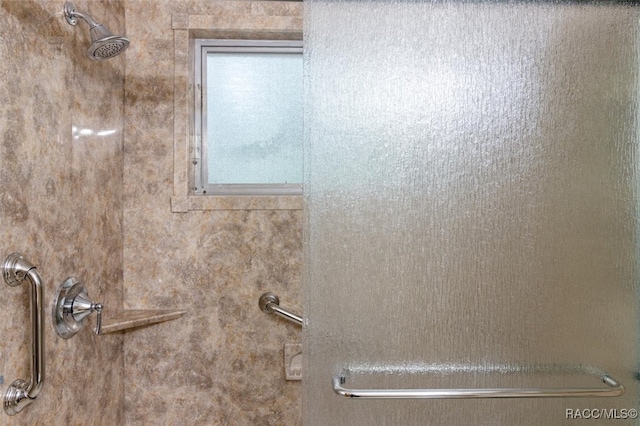 bathroom featuring walk in shower