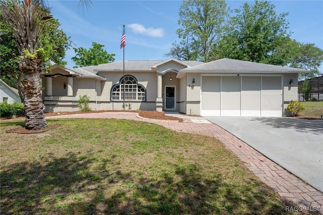 483 N Turkey Pine Loop, Lecanto, FL 34461 - single story home with an attached garage, driveway, a front yard, and stucco siding