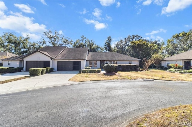 ranch-style home with a garage