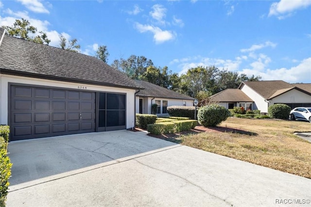 ranch-style house with a front lawn