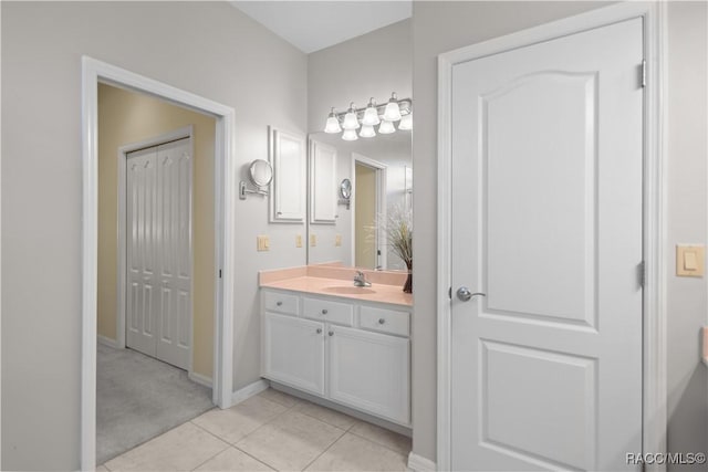 bathroom featuring tile patterned floors and vanity