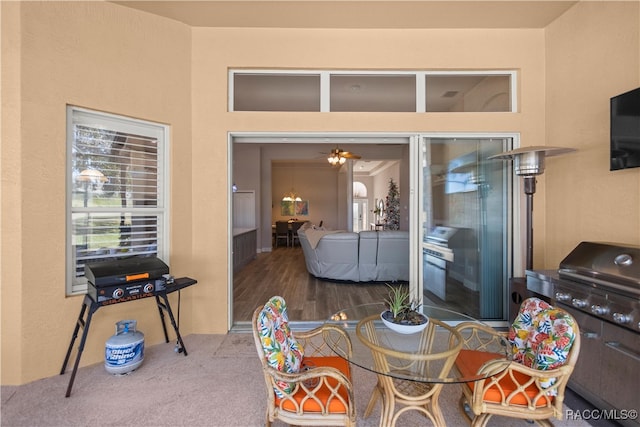 interior space with a ceiling fan