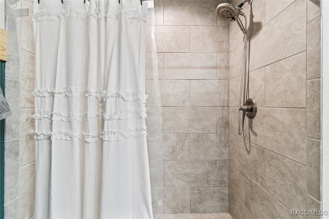 bathroom featuring curtained shower