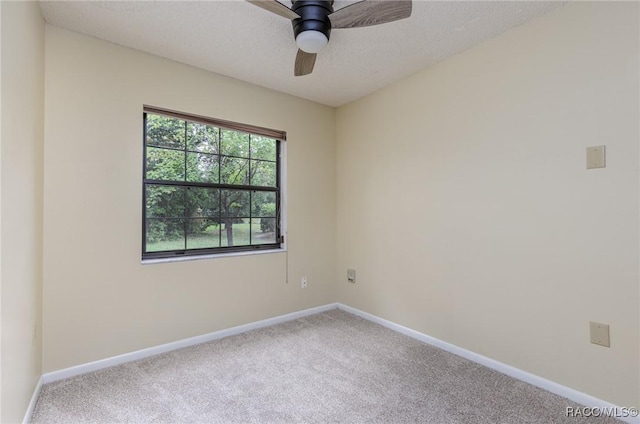 4 Chinkapin Ct, Homosassa, FL 34446 - empty room featuring carpet flooring, a ceiling fan, baseboards, and a textured ceiling