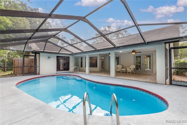 4 Chinkapin Ct, Homosassa, FL 34446 - outdoor pool featuring glass enclosure, french doors, fence, a patio, and ceiling fan
