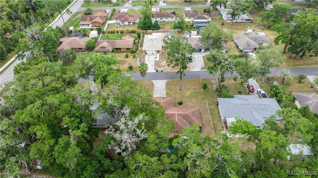 522 Hiawatha Ave, Inverness, FL 34452 - aerial view of property and surrounding area with nearby suburban area