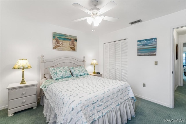 bedroom with a closet, dark carpet, and ceiling fan