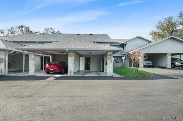 view of front of house with a carport