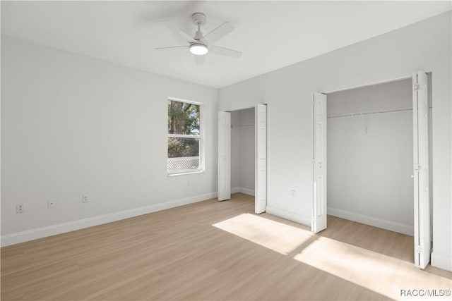 unfurnished bedroom with ceiling fan and light hardwood / wood-style floors