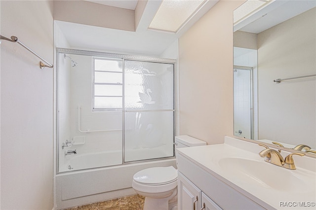 full bathroom with vanity, toilet, and enclosed tub / shower combo