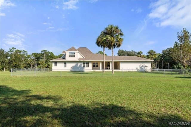 view of front facade with a front lawn