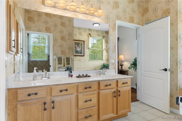 bathroom featuring tile patterned floors, plenty of natural light, and vanity