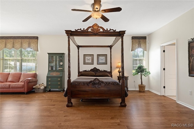 bedroom featuring ceiling fan and wood-type flooring