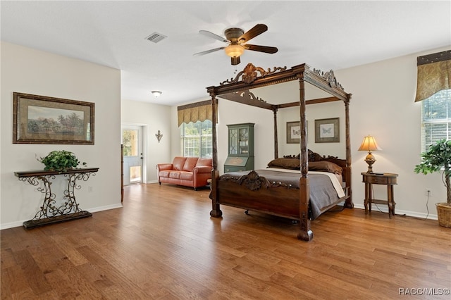 bedroom with light wood-type flooring and ceiling fan