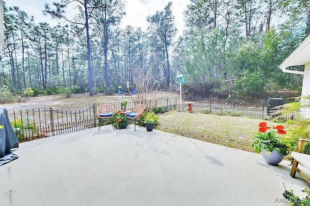 view of patio with fence