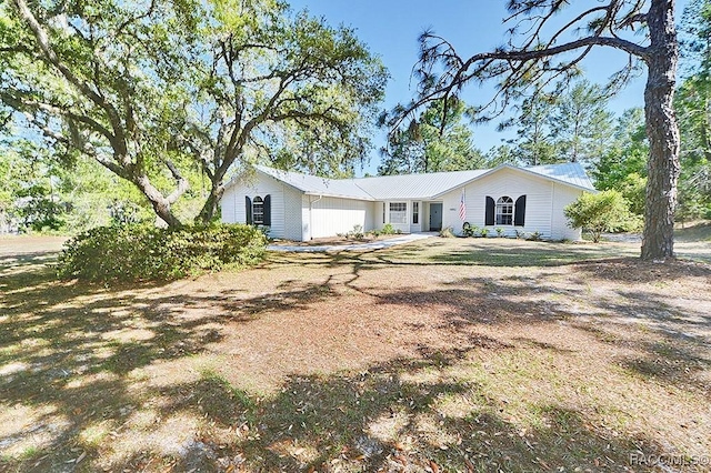 4082 W Alamo Dr, Beverly Hills, FL 34465 - ranch-style home with metal roof