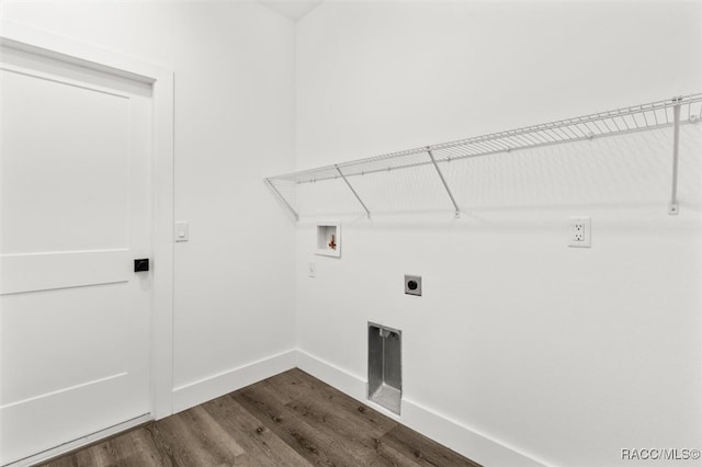 washroom featuring laundry area, baseboards, dark wood-type flooring, hookup for a washing machine, and hookup for an electric dryer