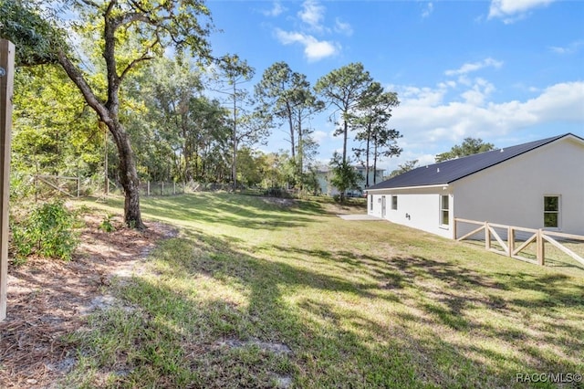 view of yard with fence