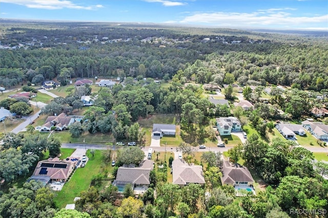 bird's eye view with a residential view and a forest view