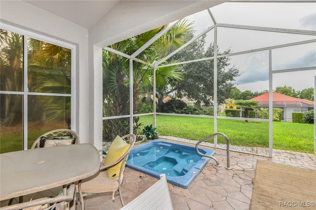 view of pool featuring an outdoor hot tub and a patio