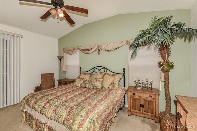 carpeted bedroom featuring ceiling fan and lofted ceiling