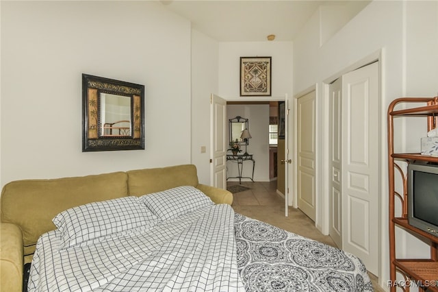 carpeted bedroom with a closet