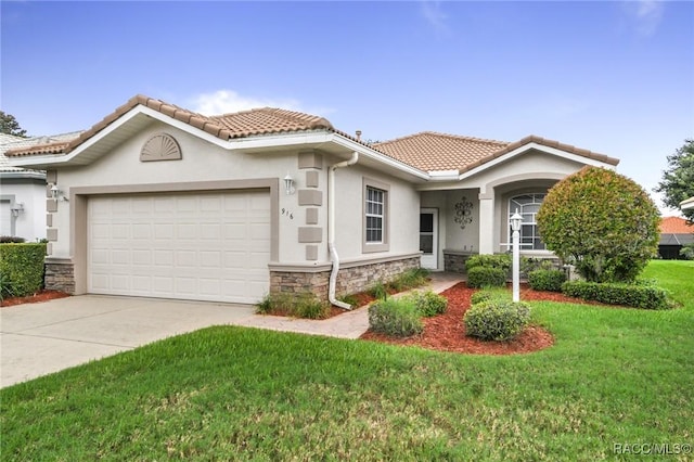 916 W Skyview Crossing Dr, Hernando, FL 34442 - view of front of property featuring stone siding, stucco siding, a garage, a tile roof, and concrete driveway