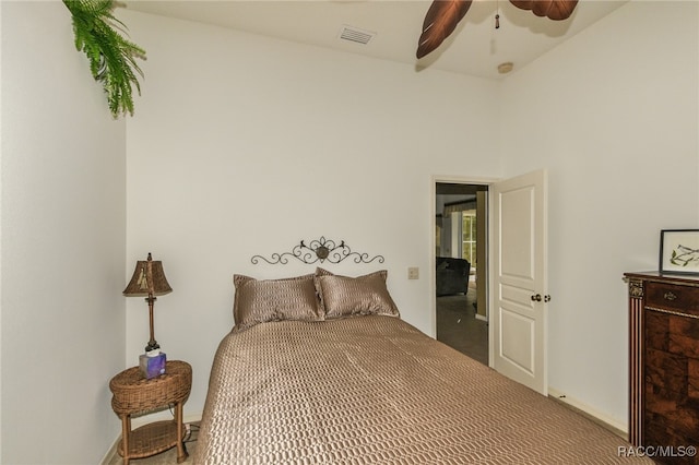 bedroom with ceiling fan and carpet