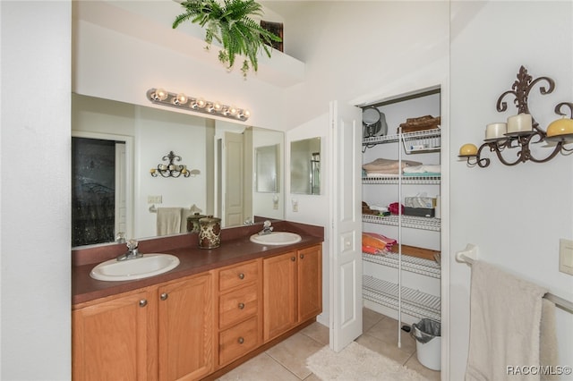 bathroom featuring tile patterned floors and vanity