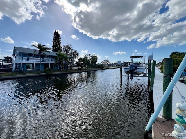 property view of water with a boat dock