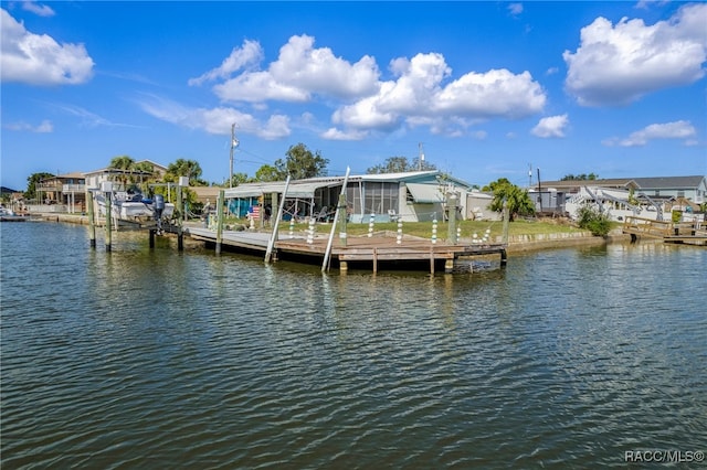 dock area with a water view