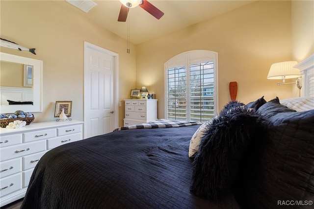 bedroom featuring vaulted ceiling and ceiling fan