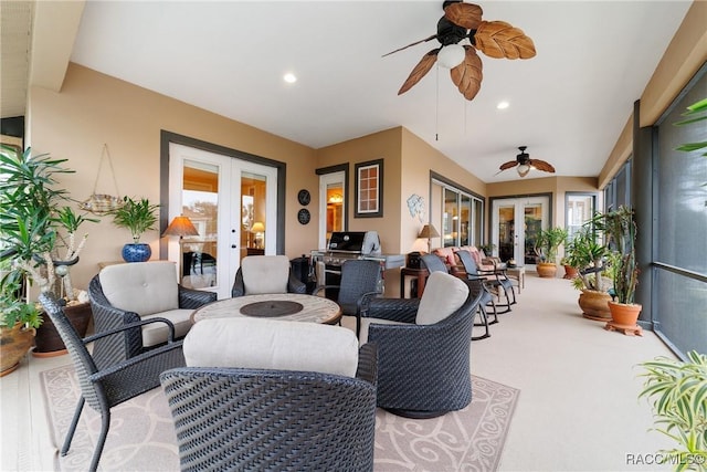 interior space with ceiling fan, french doors, an outdoor hangout area, and a grill