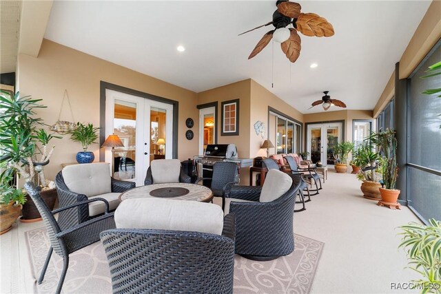 interior space with ceiling fan, french doors, an outdoor hangout area, and a grill