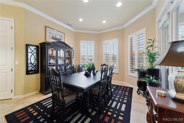 tiled dining area with crown molding