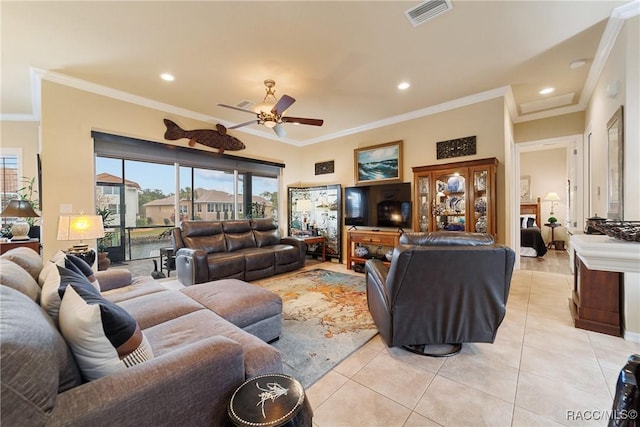 tiled living room featuring ceiling fan and crown molding