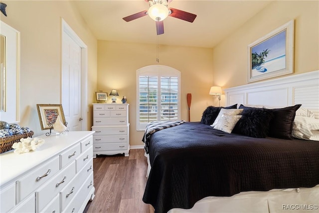 bedroom featuring ceiling fan and light hardwood / wood-style flooring