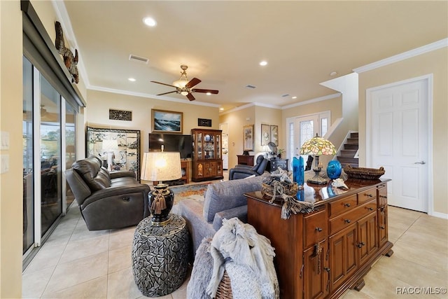 living room with french doors, ceiling fan, light tile patterned flooring, and crown molding