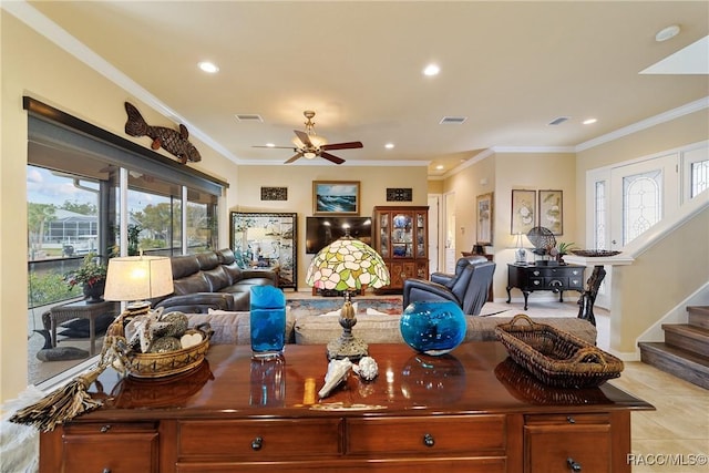 interior space featuring ceiling fan and ornamental molding