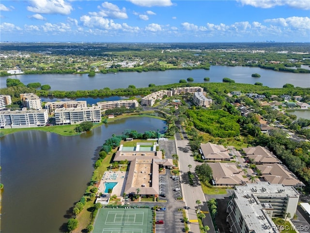 birds eye view of property featuring a water view